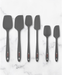 Elihome 6-piece silicone spatula set in Grey (Charcoal). Includes classic, skinny, and mini spatulas and spoonulas. Features a seamless design with red logo accents, perfect for modern minimalist kitchens.