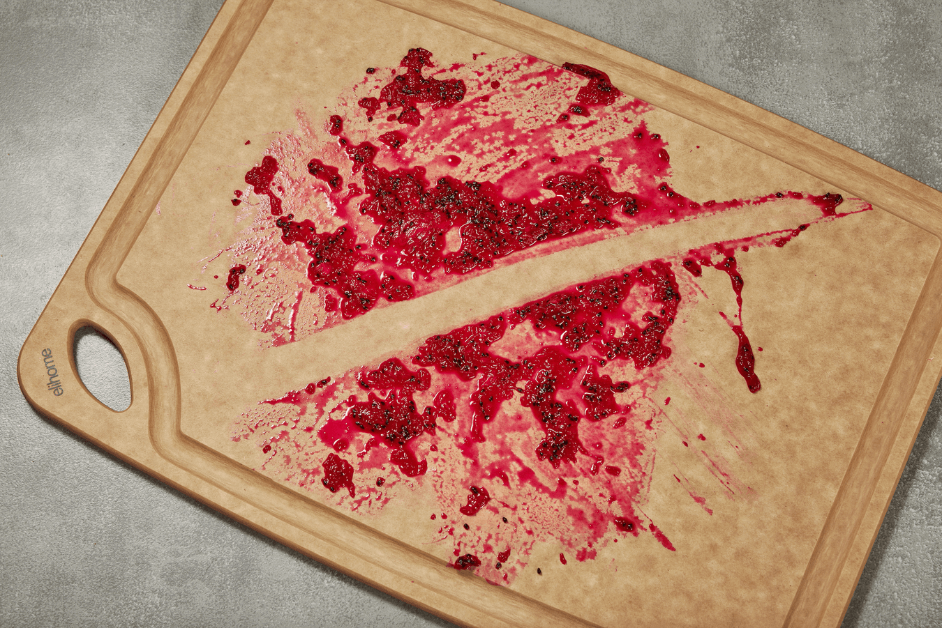 Elihome wood fiber cutting board with berry stains demonstrating non-porous surface that does not harbor bacteria and is easy to clean