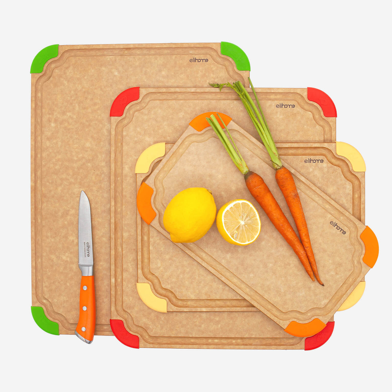 Elihome Premium Series 4-piece cutting board set with colorful silicone corners, knife, and fresh vegetables