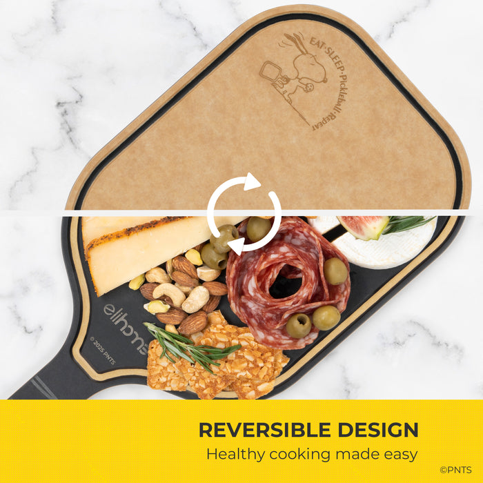 Reversible cutting board with food items on a marble background, featuring the brand 'Just Chopping'.