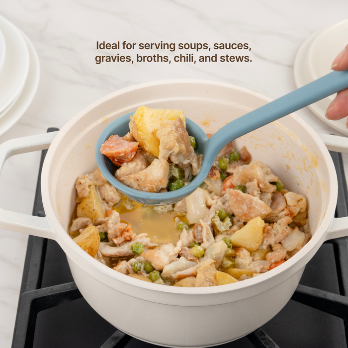 Elihome Classic Ladle in Teal Grey serving chicken and vegetable stew from a white pot on the stove, ideal for serving soups, sauces, gravies, chili and stews