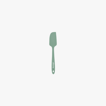 Elihome Mini Silicone Spatula in Sage Green, 8.7 inches by 1.5 inches with seamless one piece design, reinforced steel core and ergonomic non-slip handle