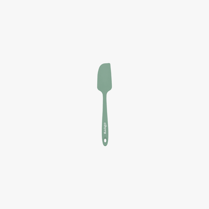 Elihome Mini Silicone Spatula in Sage Green, 8.7 inches by 1.5 inches with seamless one piece design, reinforced steel core and ergonomic non-slip handle
