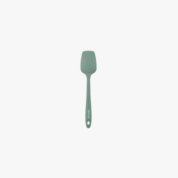 Elihome Mini Silicone Spoonula in Sage Green, 8.75 inches by 1.8 inches with seamless one piece design, reinforced steel core and ergonomic non-slip handle