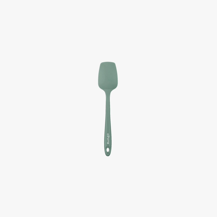 Elihome Mini Silicone Spoonula in Sage Green, 8.75 inches by 1.8 inches with seamless one piece design, reinforced steel core and ergonomic non-slip handle