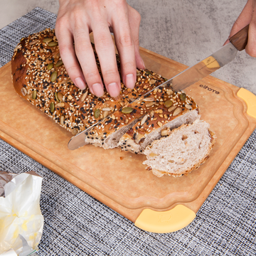 Slicing bread on Elihome Premium Series Medium Cutting Board